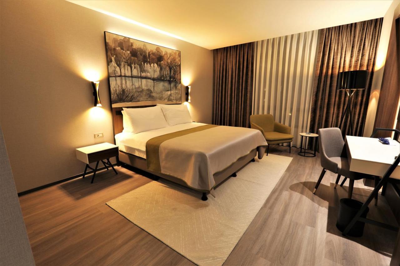 Limak Skopje Luxury Hotel Kültér fotó A bedroom
